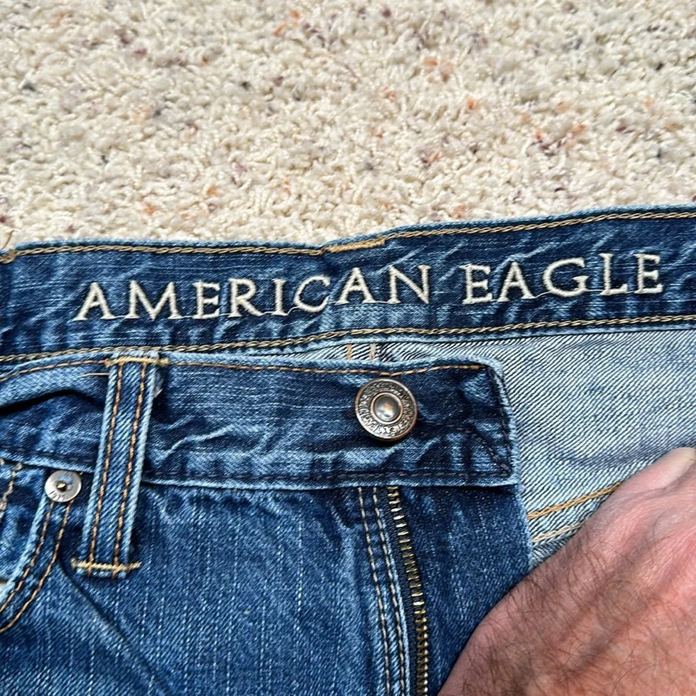 Good used condition American eagle factory distressed bootcut jeans. - Picture 9 of 11